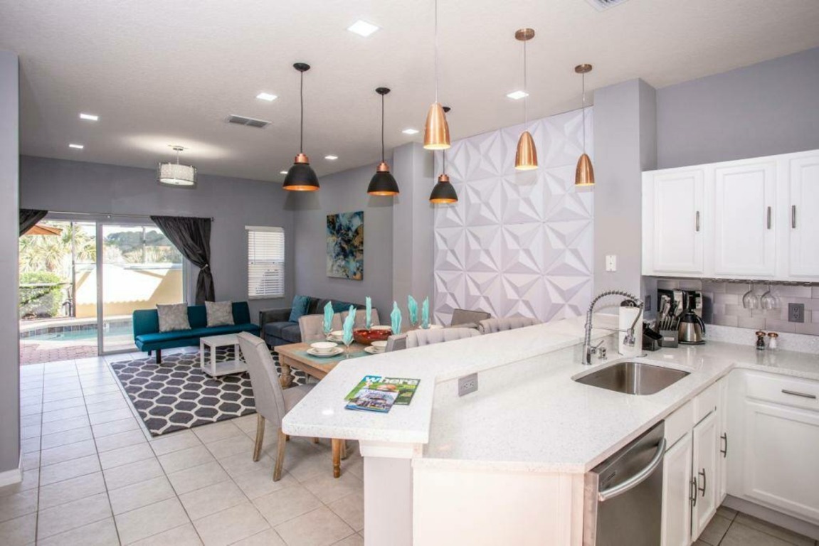 Sala de casa de 3 quartos no Encantada Resort